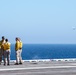 Sailors Observe A P-8A Poseidon Flyby