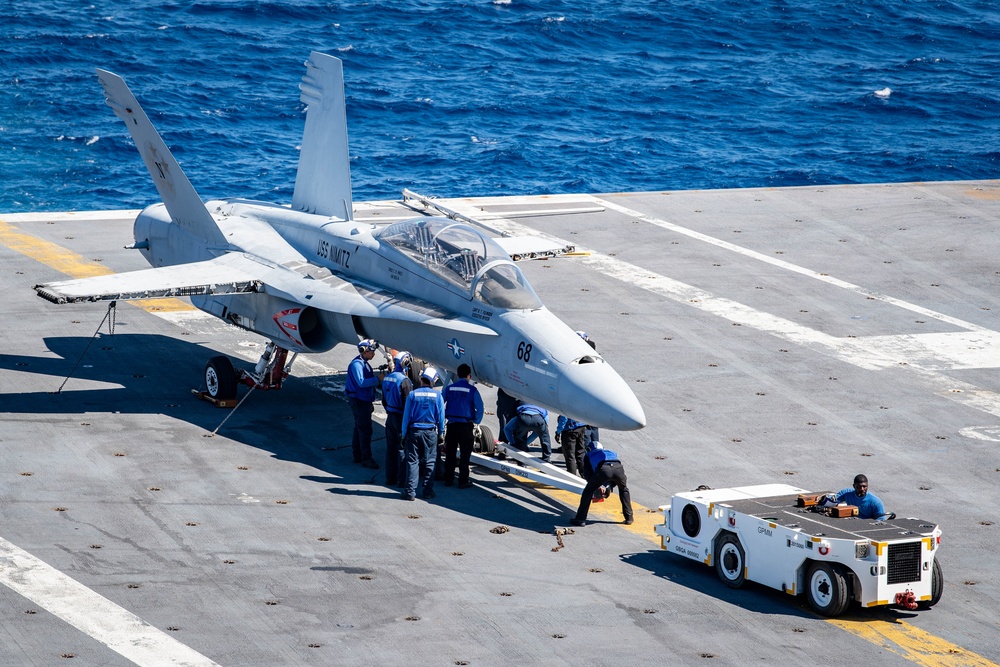 Sailors Chock Down A Trainer Jet