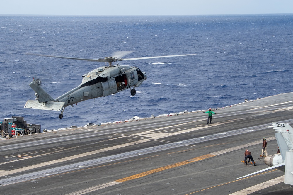 USS Ronald Reagan (CVN 76) conducts a vertical replenishment refresher