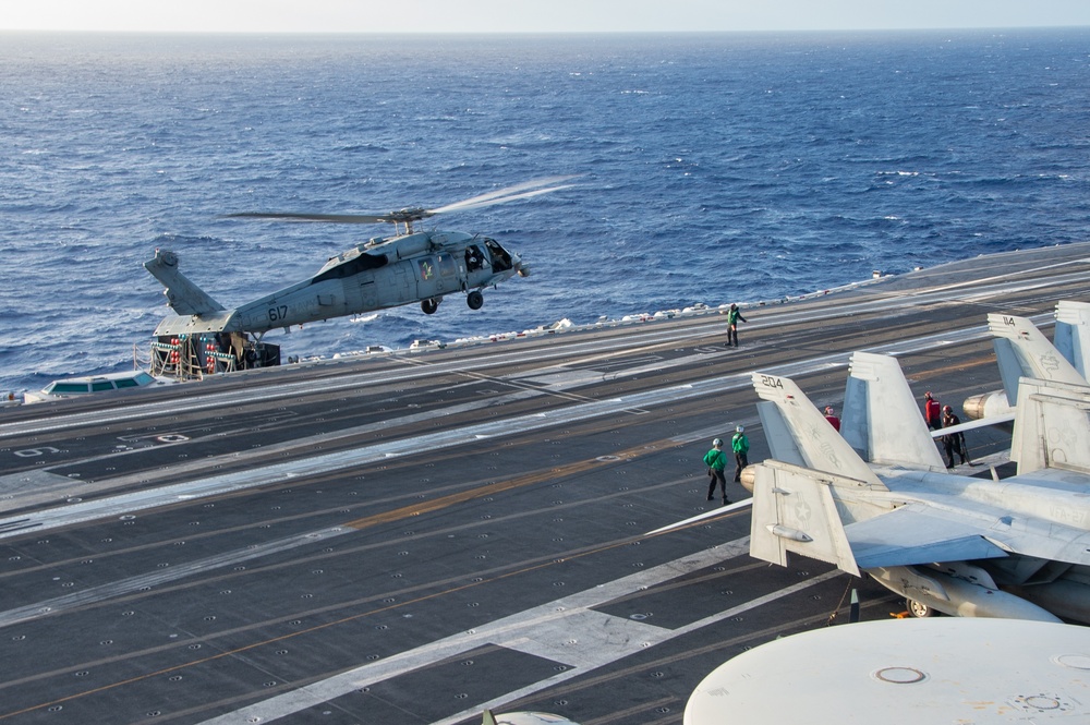 Members of EODMU 5 Prepare to Conduct Fast-Rope Exercise aboard USS Ronald Reagan (CVN 76)