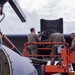 Maintenance Airmen replace C-130 Hercules aircraft engine