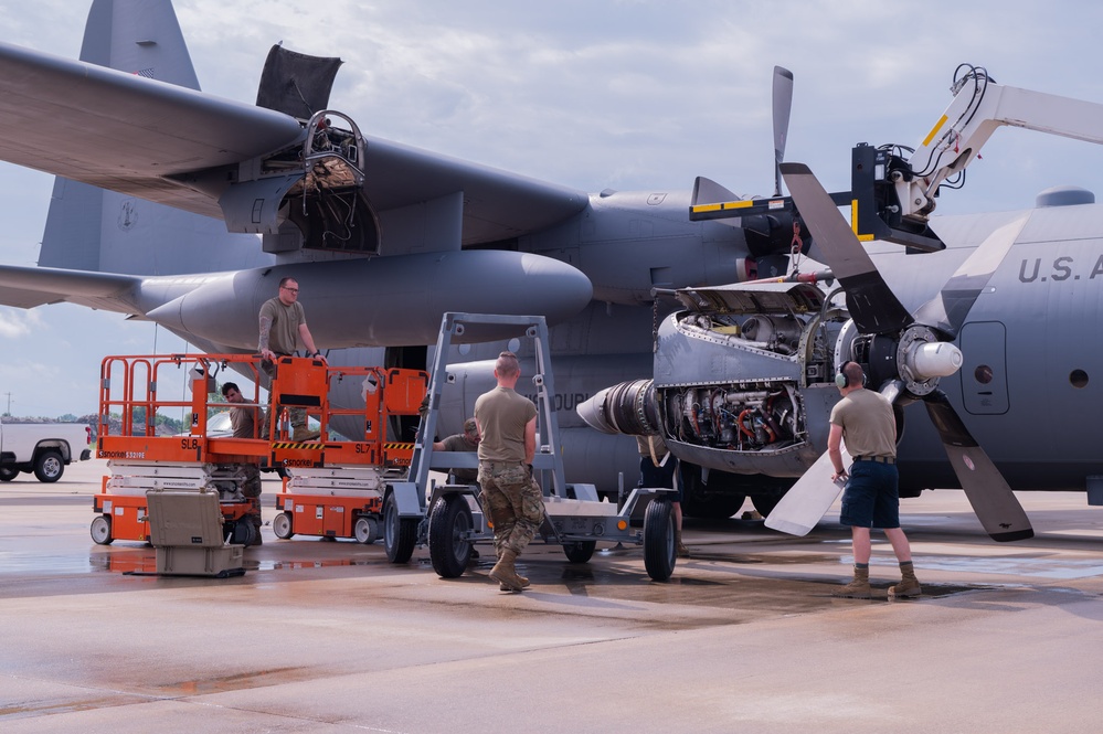 Maintenance Airmen replace C-130 Hercules aircraft engine