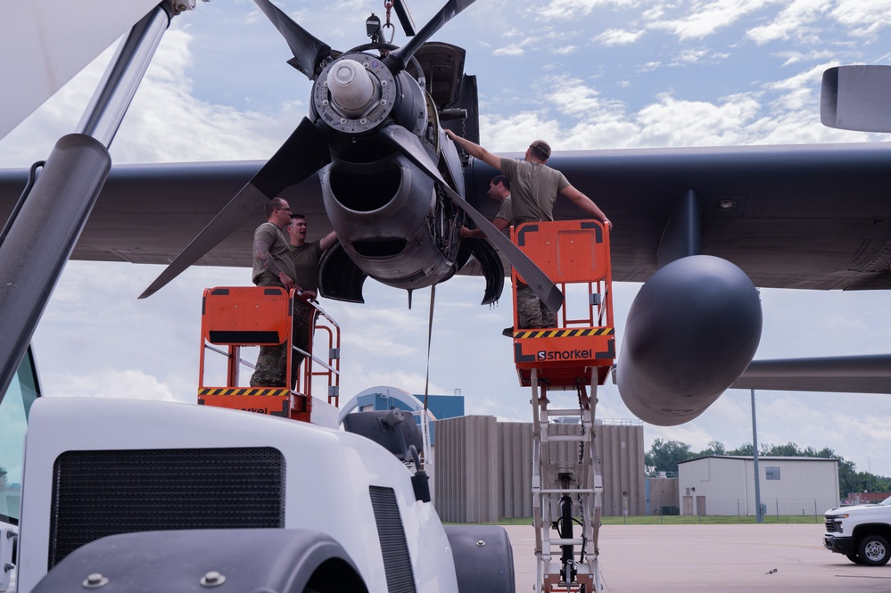 Maintenance Airmen replace C-130 Hercules aircraft engine