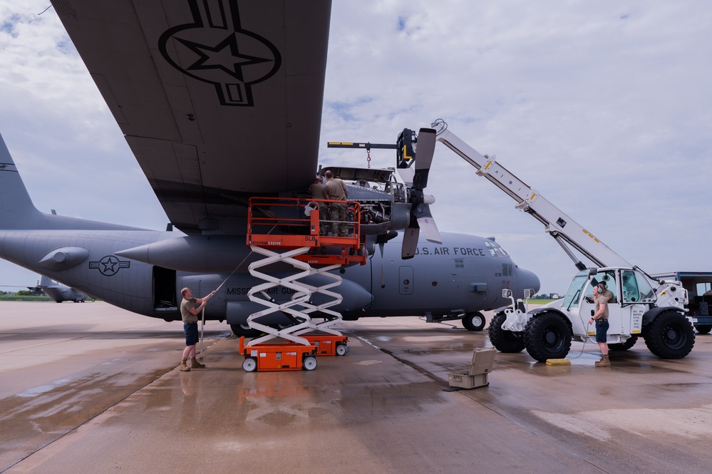 Maintenance Airmen replace C-130 Hercules aircraft engine