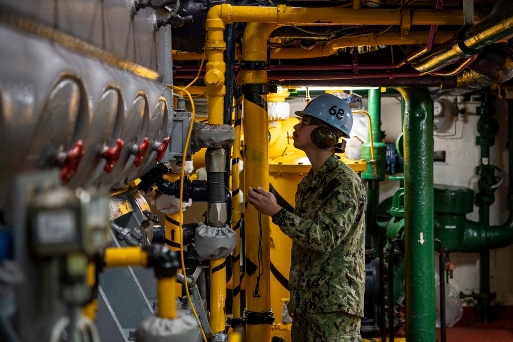 Engineman Conducts Check Of Diesel Generator