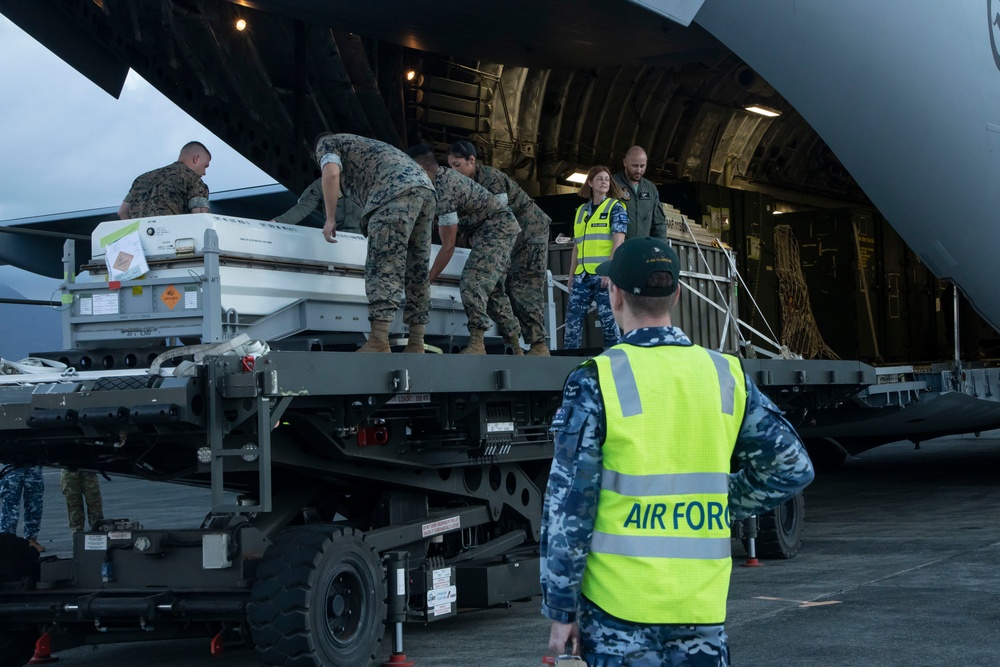 MALS-24 and Royal Australian Air Force unload a C-17