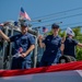 Coast Guard members participate in Fourth of July parade