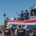 Coast Guard members participate in Fourth of July parade