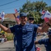 Coast Guard members participate in Fourth of July parade