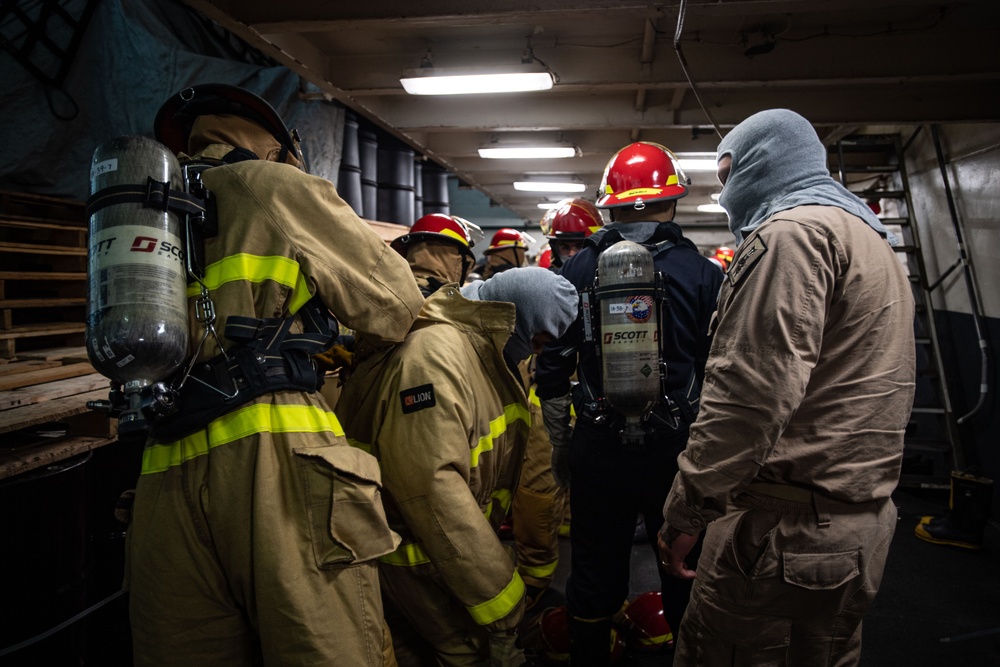 Sailors Participate In A General Quarters Drill