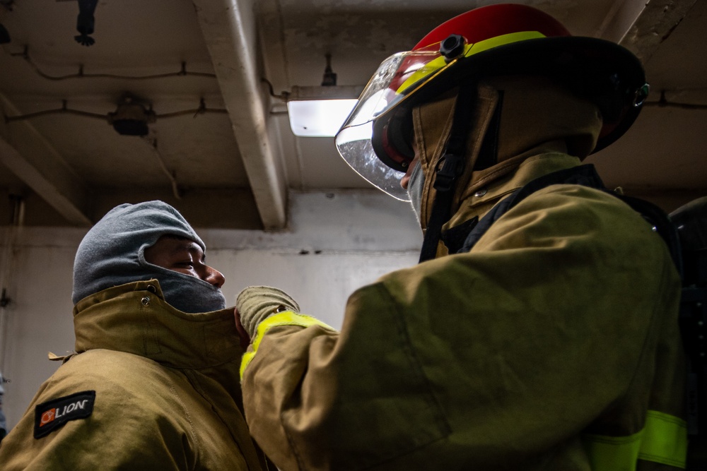 Sailors Participate In A General Quarters Drill