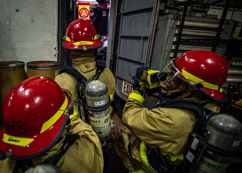 Sailors Participate In A General Quarters Drill
