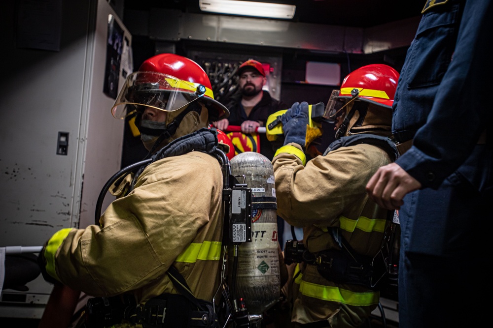 Sailors Participate In A General Quarters Drill