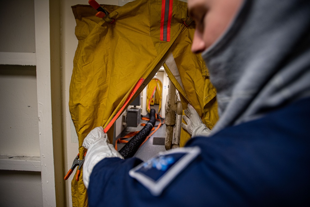 Sailors Participate In A General Quarters Drill