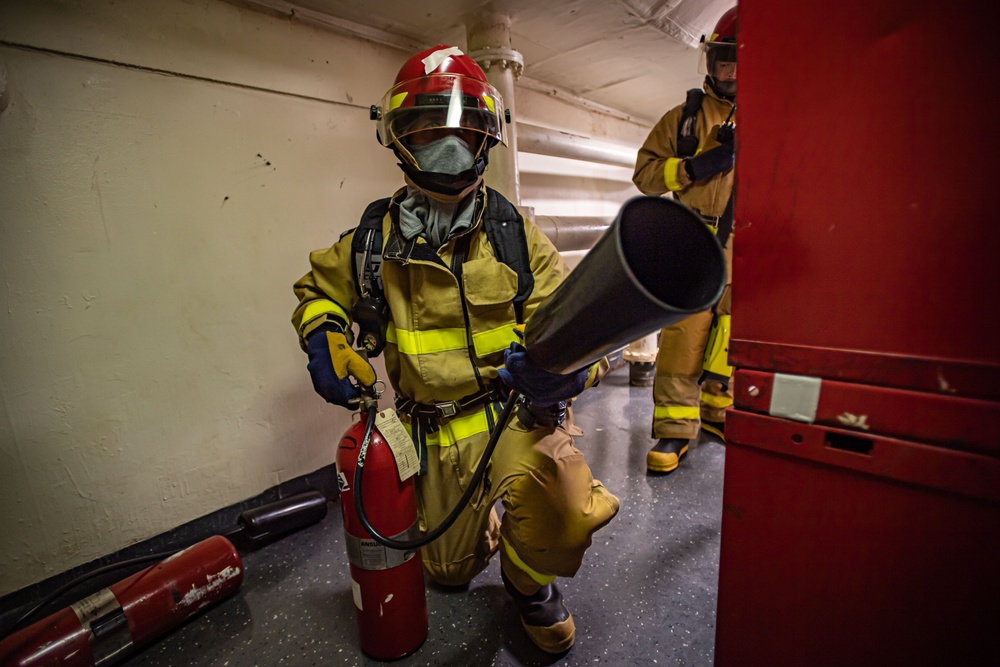 Sailors Participate In A General Quarters Drill