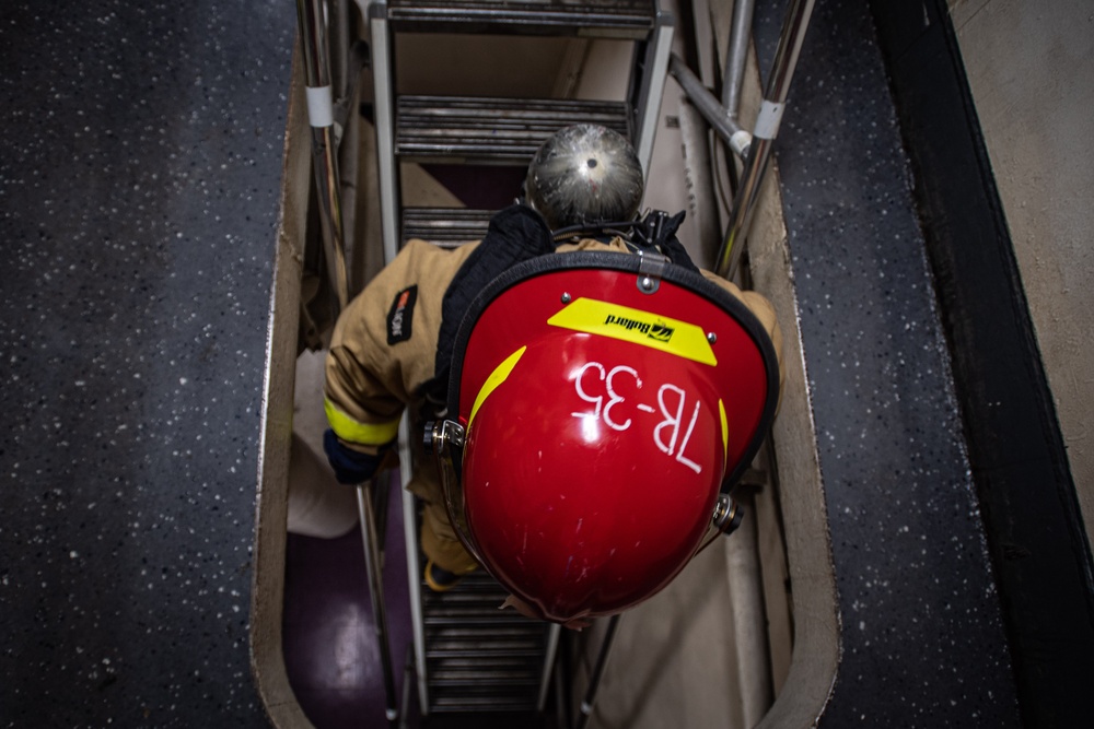 Sailors Participate In A General Quarters Drill