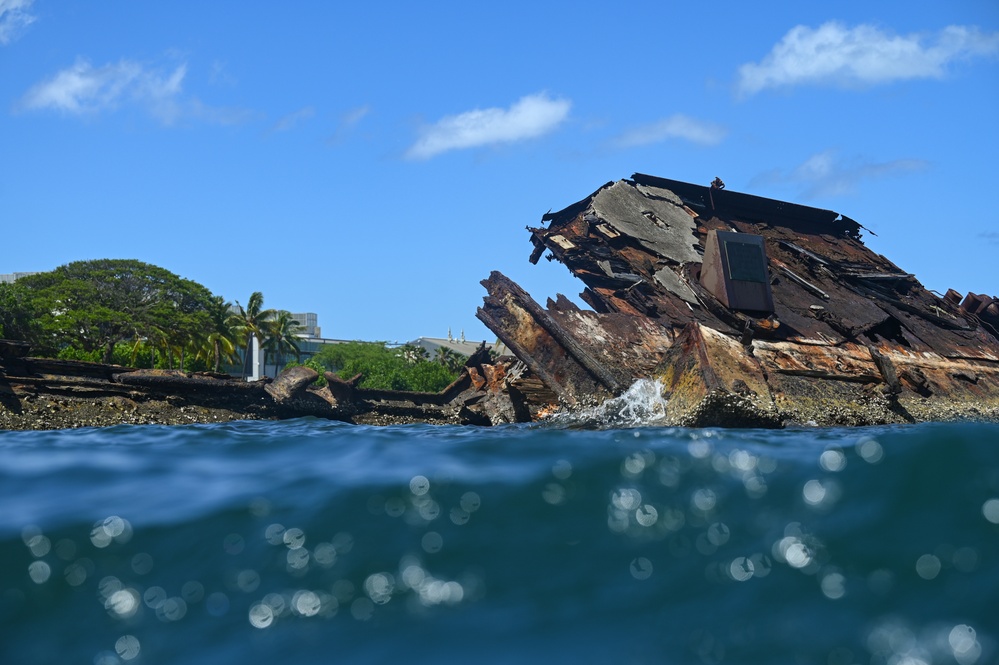 U.S., Canadian divers scan the USS Utah Memorial during RIMPAC 2024