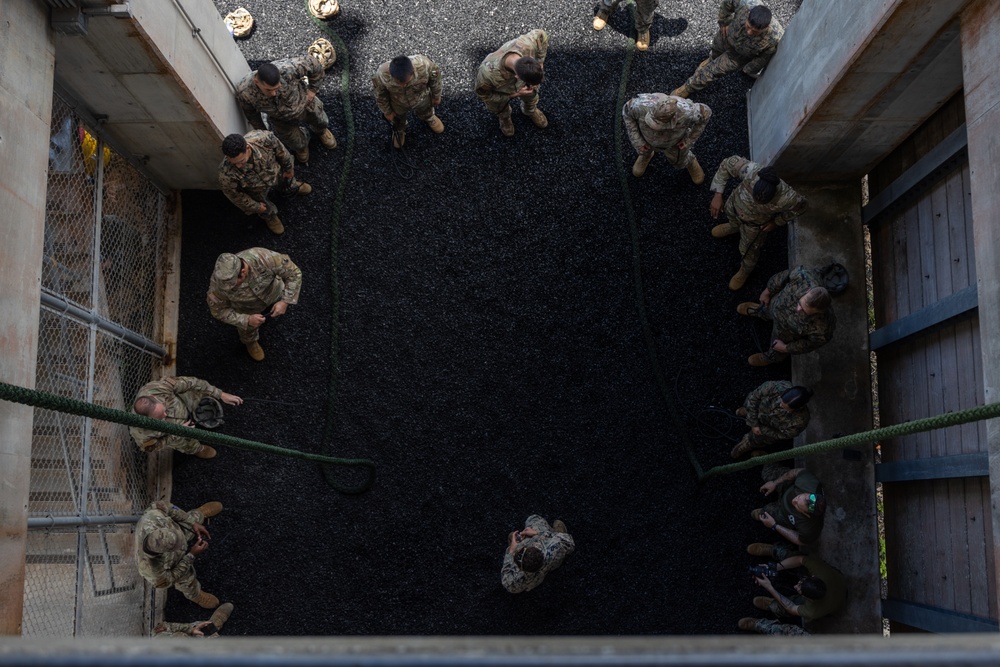 Service Members Participate in a Helicopter Rope Suspension Techniques Course