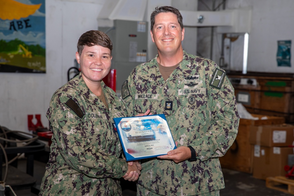 NAS Pensacola Sailor presented Enlisted Surface Warfare Device