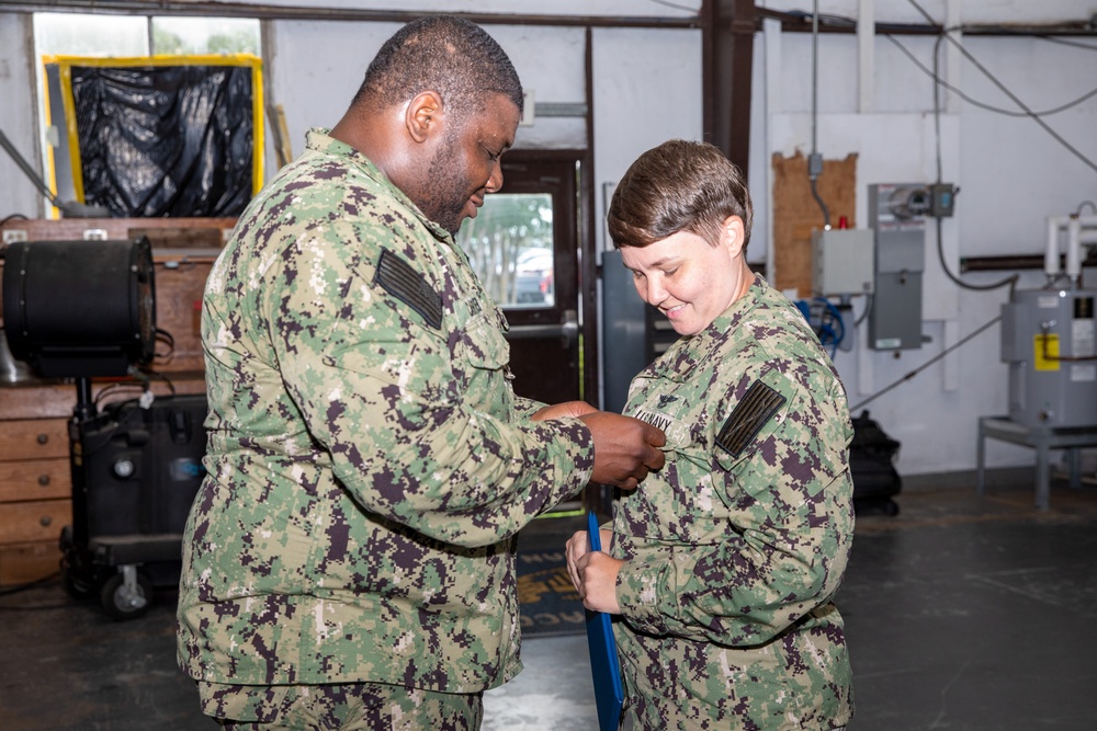 NAS Pensacola Sailor presented Enlisted Surface Warfare Device