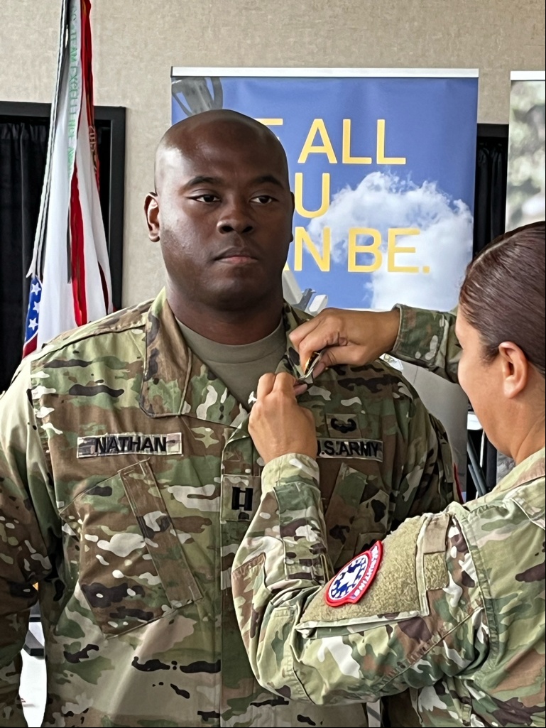 Commander earns Gold Recruiter Badge