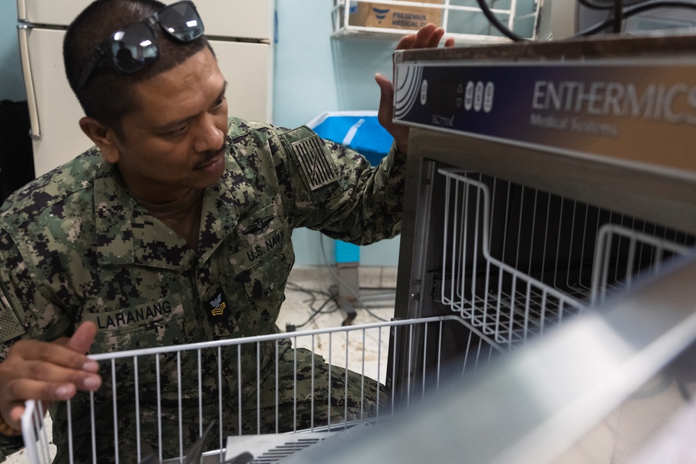 Sailors assess repairs at the Kingston Public Hospital