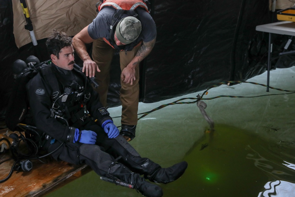 US Navy Divers Complete Ice Dives at Camp Ripley