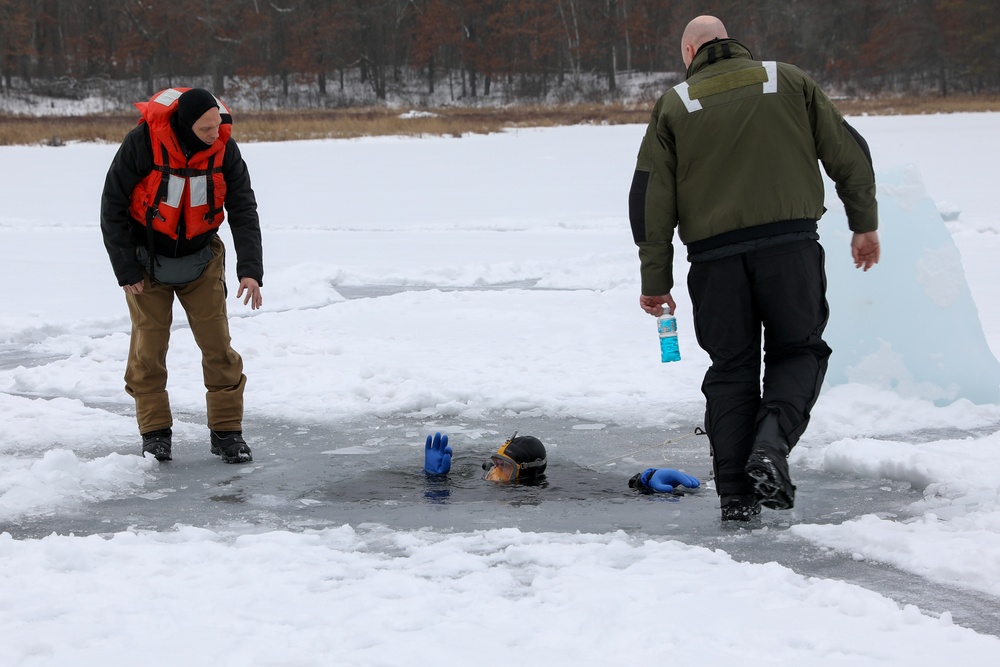 US Navy Divers Complete Ice Dives at Camp Ripley