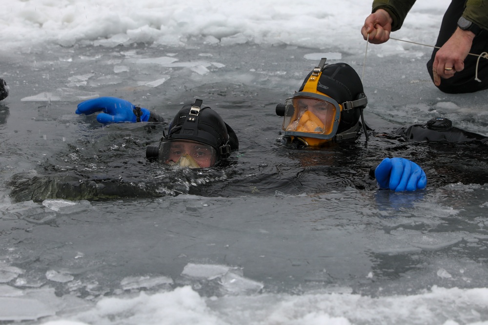 US Navy Divers Complete Ice Dives at Camp Ripley