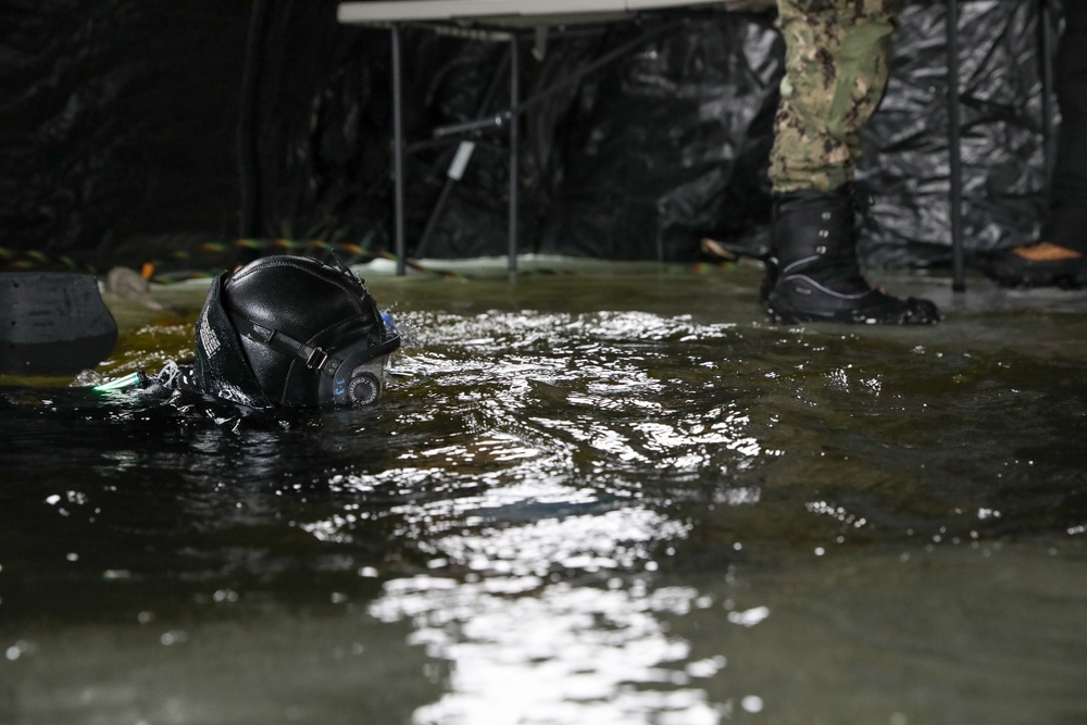 US Navy Divers Complete Ice Dives at Camp Ripley
