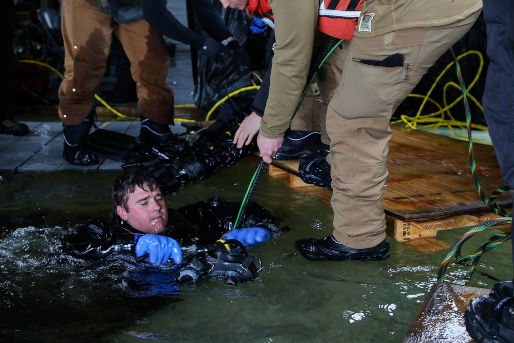 US Navy Divers Complete Ice Dives at Camp Ripley