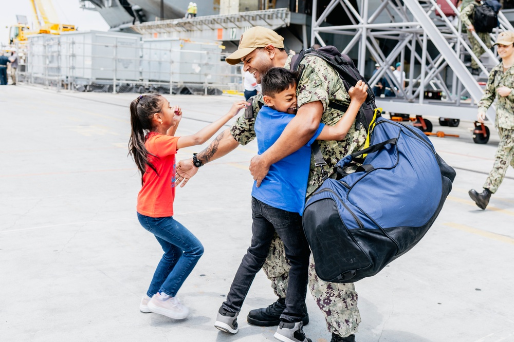 Sailors greet family after Deployment