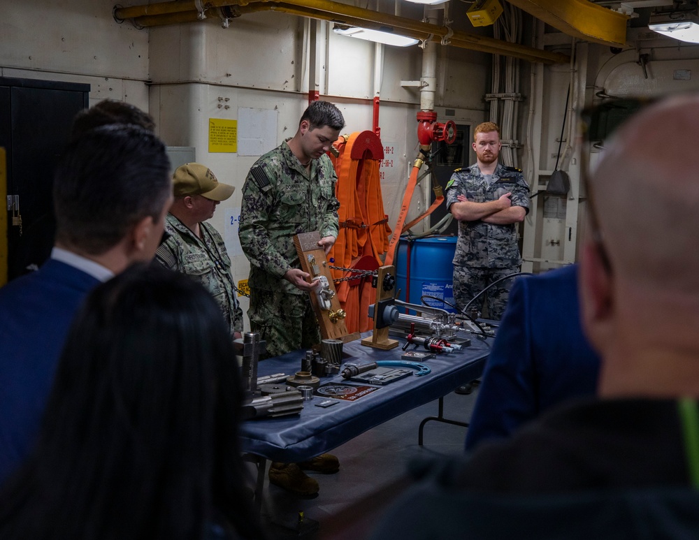 Emory S. Land Hosts Tour in Sydney