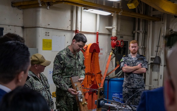 Emory S. Land Hosts Tour in Sydney