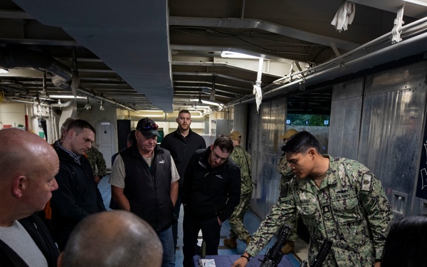 Emory S. Land Hosts Tour in Sydney