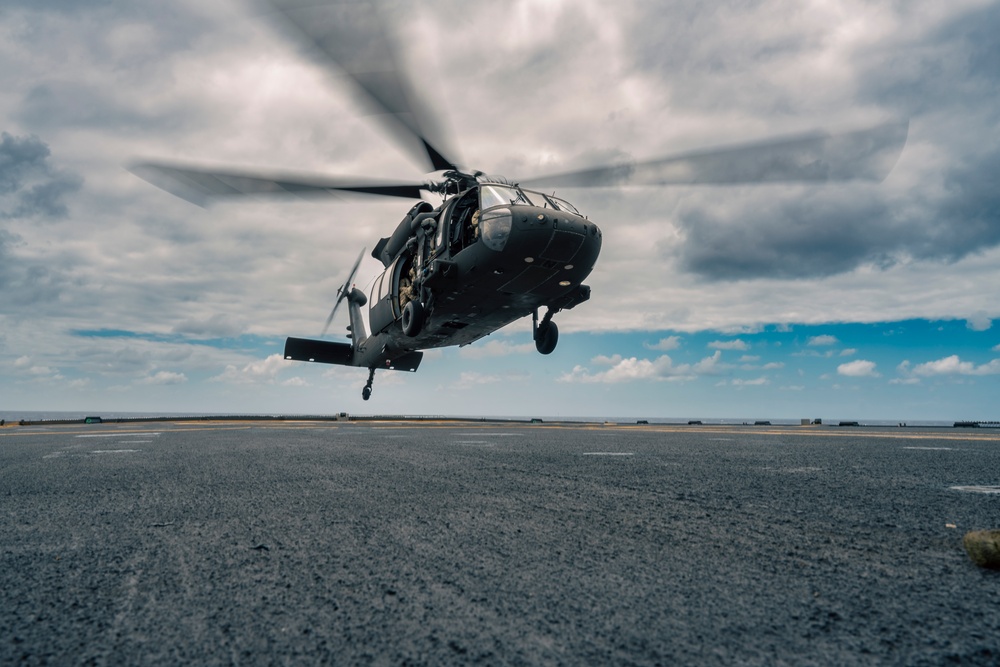 25th Combat Aviation Brigade Black Hawk Lands on the Flight Deck of Royal Canadian Navy Ship Max Bernays