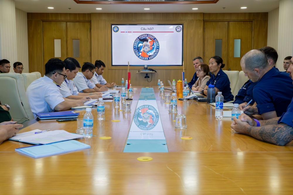 Members of the U.S. Navy, U.S. Coast Guard, U.S. 7th Fleet, and Vietnamese Navy and Coast Guard participate in a joint U.S. – Vietnam subject matter expert exchange