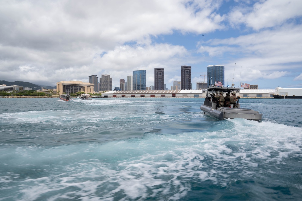 US Coast Guardsmen with Maritime Safety and Security Team conduct security exercise during RIMPAC 2024