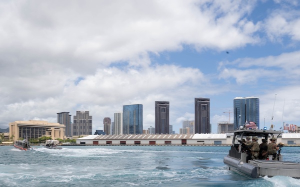 US Coast Guardsmen with Maritime Safety and Security Team conduct security exercise during RIMPAC 2024