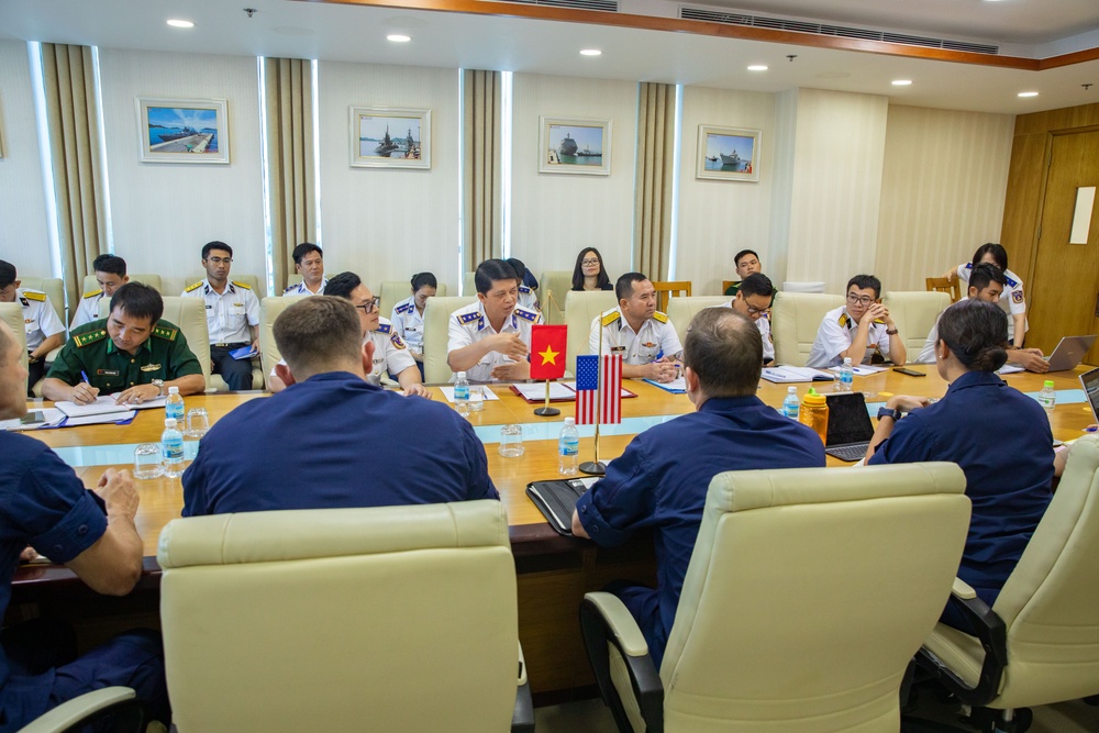 Members of the U.S. Navy, U.S. Coast Guard, U.S. 7th Fleet, and Vietnamese Navy and Coast Guard participate in a joint U.S. – Vietnam subject matter expert exchange