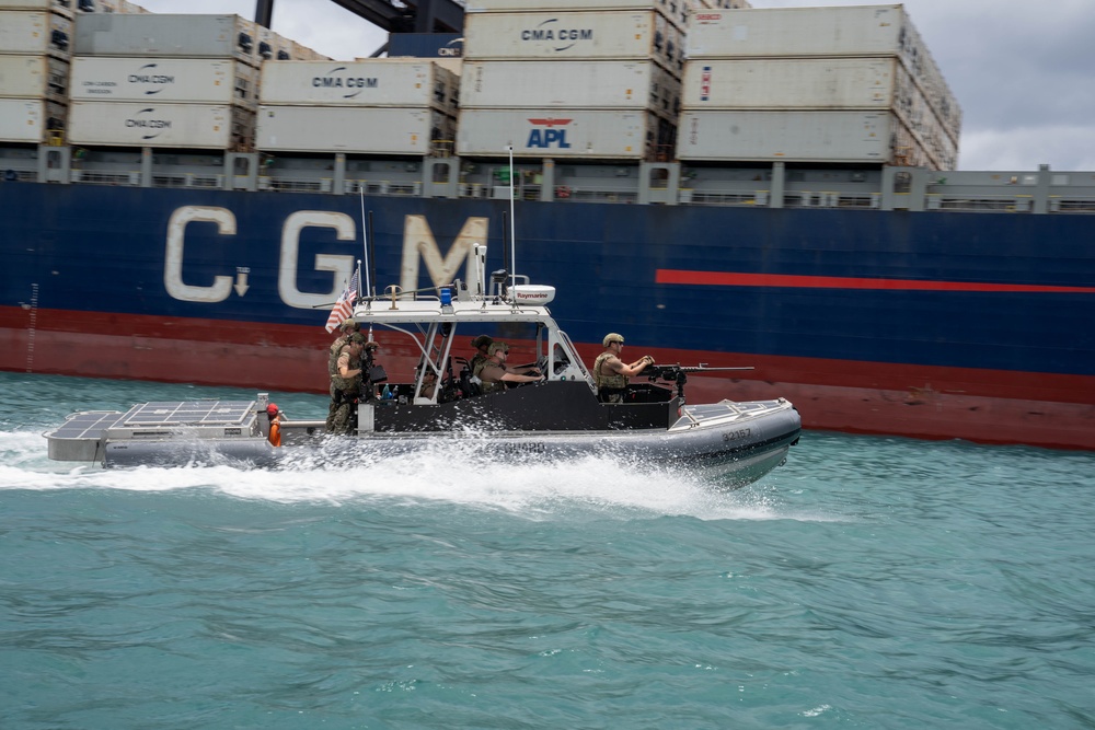 US Coast Guardsmen with Maritime Safety and Security Team conduct security exercise during RIMPAC 2024