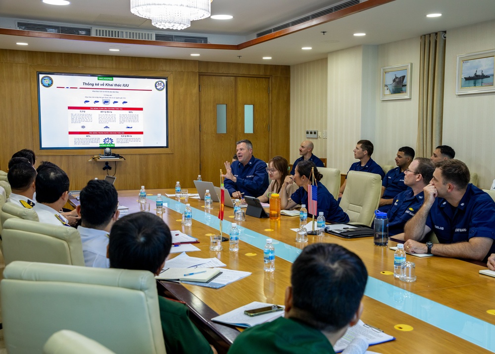 Members of the U.S. Navy, U.S. Coast Guard, U.S. 7th Fleet, and Vietnamese Navy and Coast Guard participate in a joint U.S. – Vietnam subject matter expert exchange