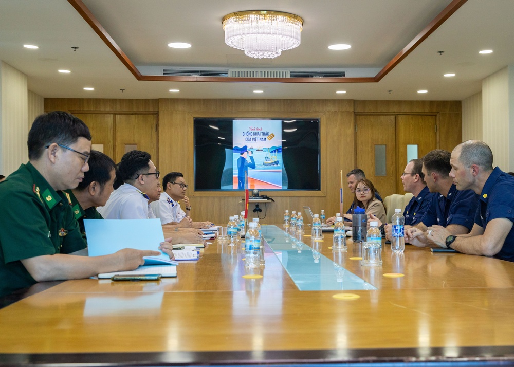 Members of the U.S. Navy, U.S. Coast Guard, U.S. 7th Fleet, and Vietnamese Navy and Coast Guard participate in a joint U.S. – Vietnam subject matter expert exchange