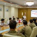 Members of the U.S. Navy, U.S. Coast Guard, U.S. 7th Fleet, and Vietnamese Navy and Coast Guard participate in a joint U.S. – Vietnam subject matter expert exchange