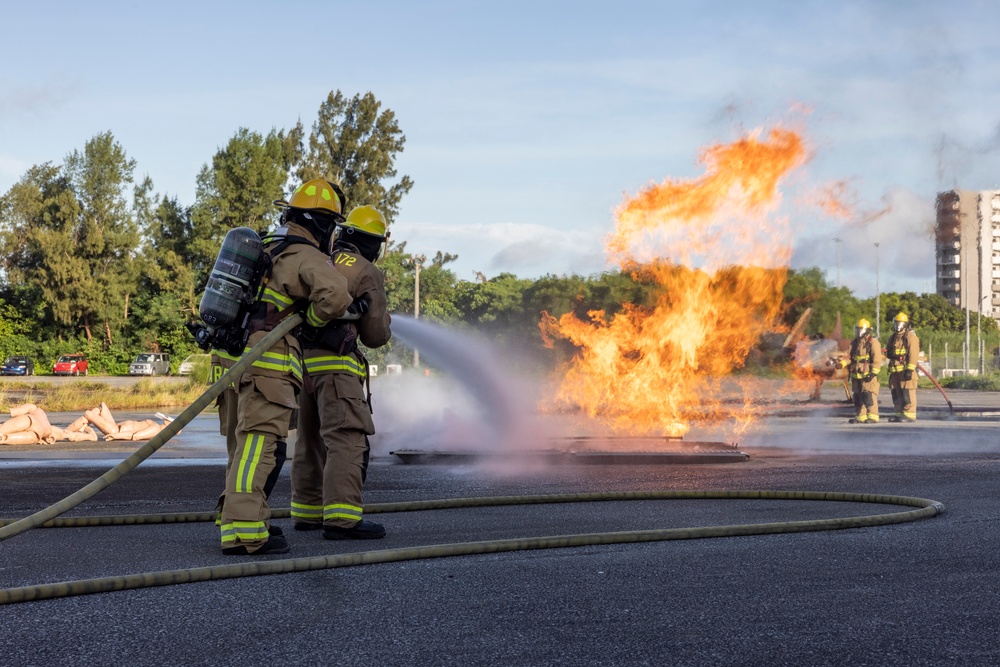 U.S. Marines, Air Force extinguish simulated aircraft fires