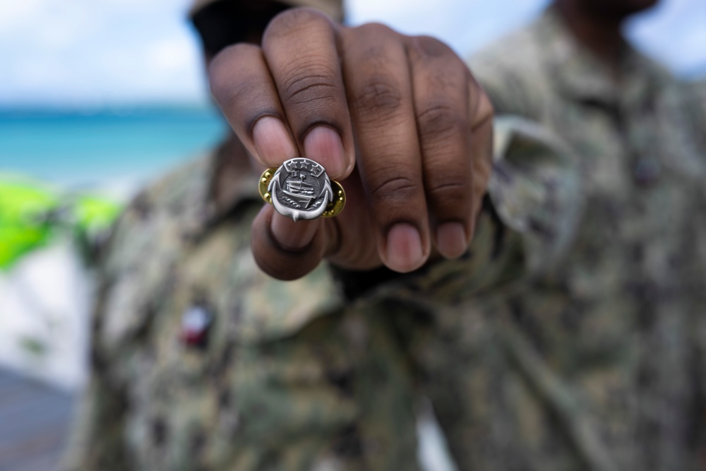 Sailors aboard Diego Garcia receive their Small Boat Qualification