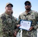 Sailors aboard Diego Garcia receive their Small Boat Qualification