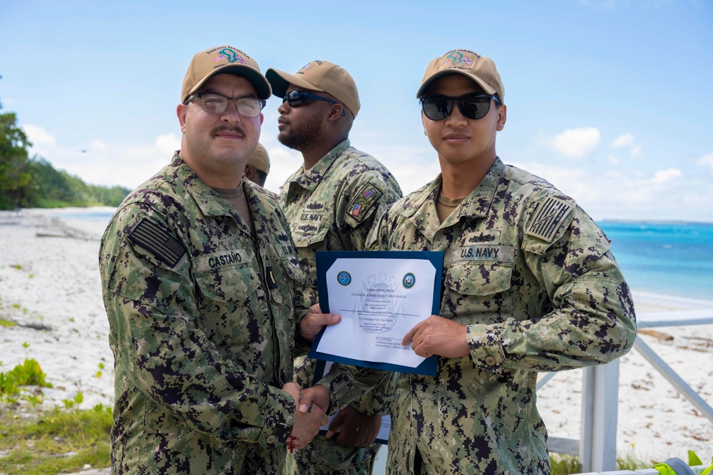 Sailors aboard Diego Garcia receive their Small Boat Qualification