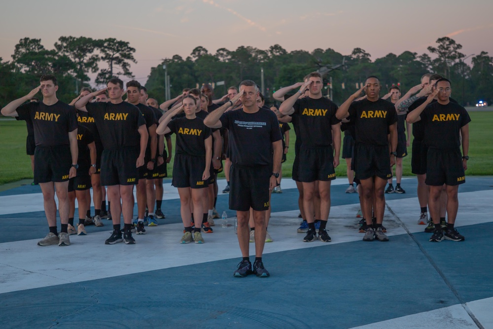 U.S. Army cadets conduct physical training with 3rd Infantry Division senior enlisted leader