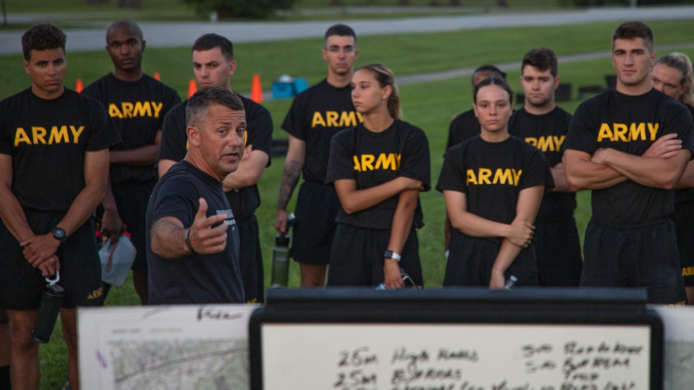 U.S. Army cadets conduct physical training with 3rd Infantry Division senior enlisted leader